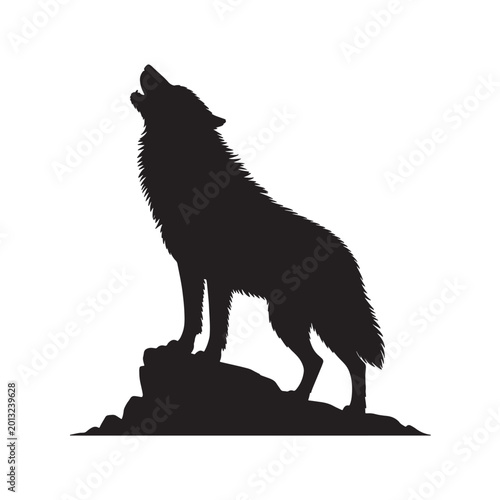 Obraz na plátně Silhouette of a wolf howling on a rock formation with black and white, mountain