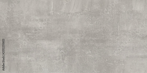 A dark aged grey grunge metal texture with a vintage rough concrete stone pattern creates a seamless dirty backdrop for a weathered old wall wallpaper design