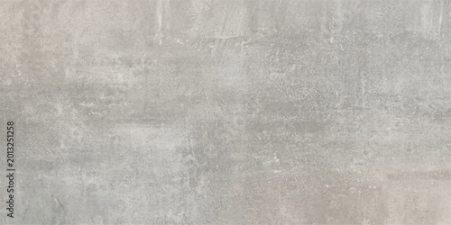 A dark aged metal backdrop features a brushed grunge texture with a rough grey stone pattern on an old vintage concrete surface