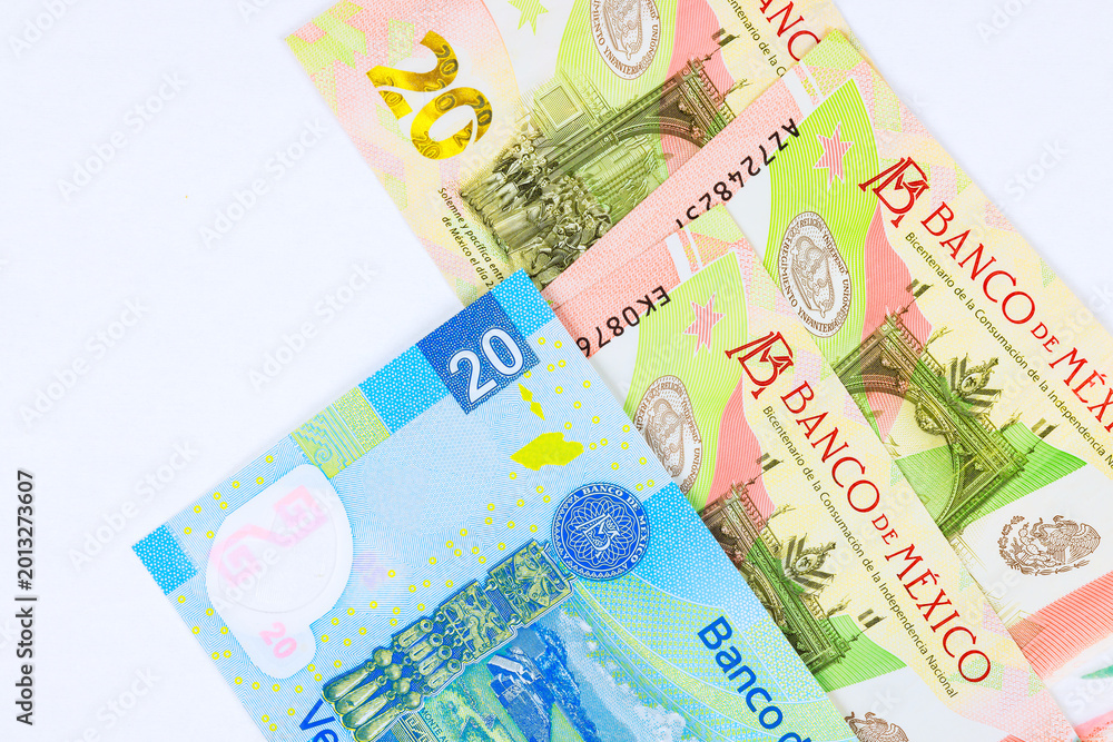 Obraz premium Mexican currency in form of banknotes bills denominations of 20 pesos.