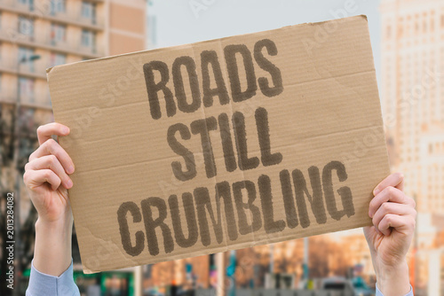 Foto "Roads Still Crumbling" Chronic underfunding of surface transportation infrastructure produces expanding networks of deteriorated roadways
