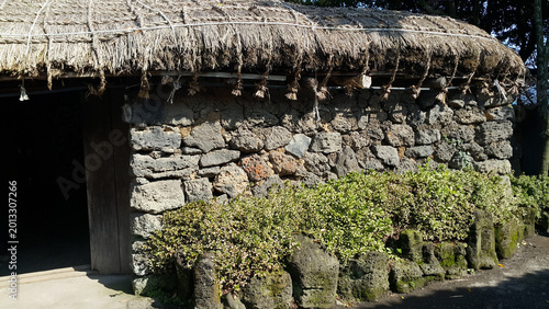 Bilde på lerret Korean Folk House Wall and thatched roof in Jeju.