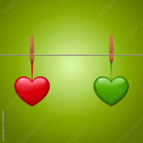 Hearts hanging on a line with clothespins.