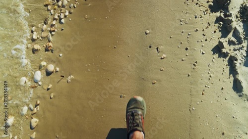 POV Shot Looking Down at Feet Walking on Sandy Beach