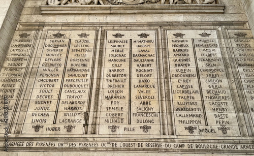 Carved name panels and stone detail on the Arc de Triomphe in Paris