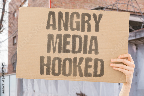 Фотография "Angry Media Hooked" Outrage-based content keeps viewers engaged longer than neutral stories