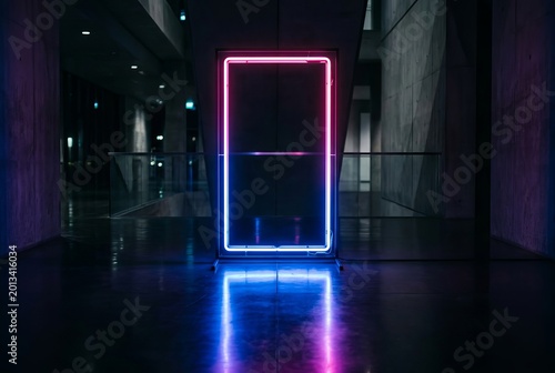 Vibrant Neon Rectangle Frame Glowing in Dark Modern Interior.