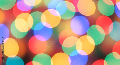 Colorful bokeh lights abstract background texture.