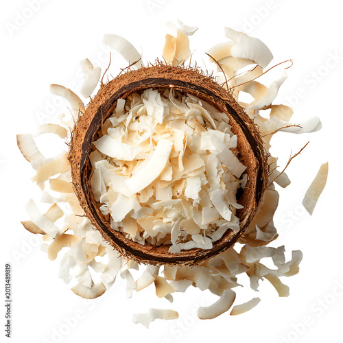 fresh coconut with shredded meat and shell on white background minimalist composition