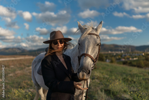 Photography Woman horse portrait stylish model standing with white dapple grey animal outdoo