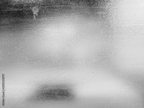Shiny Silver Grunge Glass Window Background with Grain, Suitable for Color Cast and Overlay.