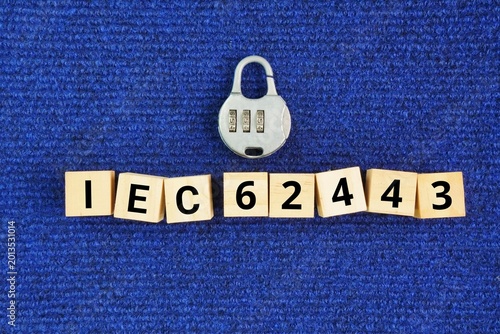 Cuadro en lienzo Wooden cube and key with the words IEC 62443