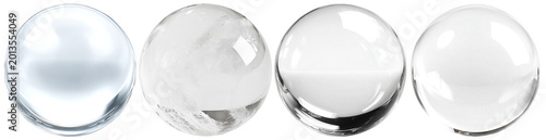 Fotografie Four unique crystal balls displaying internal textures and reflections, isolated on a transparent background