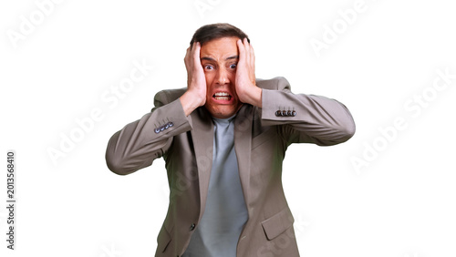 Cuadro en lienzo Stressed man panicking with hands on head