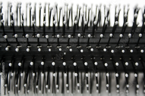 Close-up of hair roller comb. Hairstylist equipment