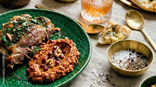 Gourmet Middle Eastern Lamb With Herbed Mint Yogurt Dip on Rustic Table Setting Middle Eastern Cuisine
