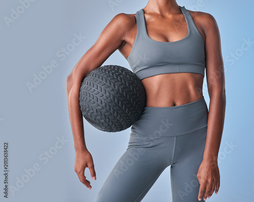 Schilderij op canvas Fitness, medicine ball and abs with woman in studio for health, gym equipment and workout challenge