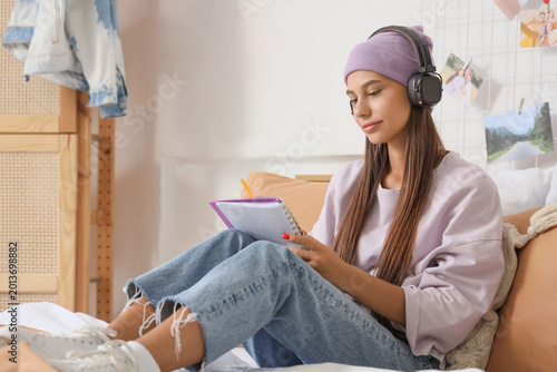 Teenage girl with headphone...