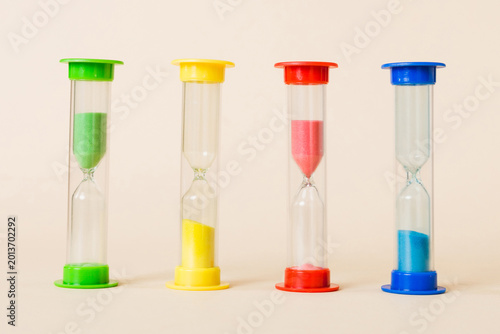 hourglass on the table, sand clock as time passing concept for business deadline, copy space