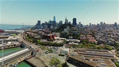 Drone view above downtown San Francisco marina and waterfront skyline