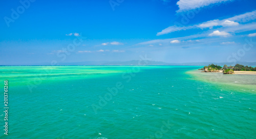Panoramic view of emerald green sea and blue sky in Okinawa, Japan (Copy space for design)