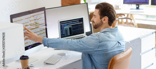 Male programmer at workplac...