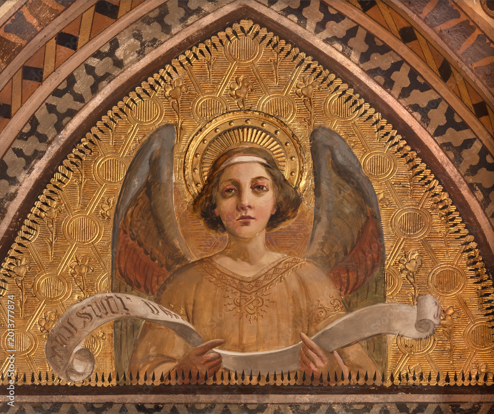 Fototapeta premium BERGAMO, ITALY - MARCH 18, 2026: The neo gothic freesco of angel with the inscription in the church Oratorio dell Immacolata by unknown artis from beginn of 20. cent.
