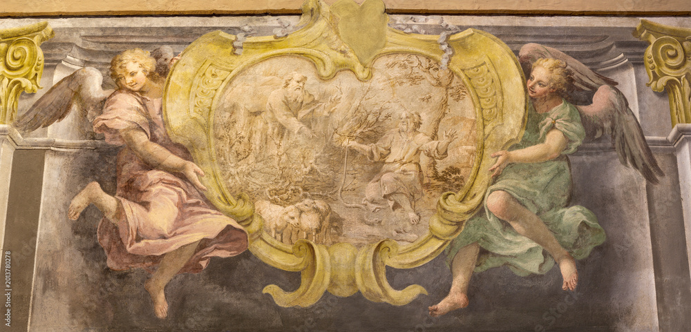 Fototapeta premium CREMA, ITALY - MARCH 20, 2026: The fresco of God appeared moses in the burning bush the church Santuario di Santa Maria della Croce by Giacomo Parravicino - il Gianolo from year 1721