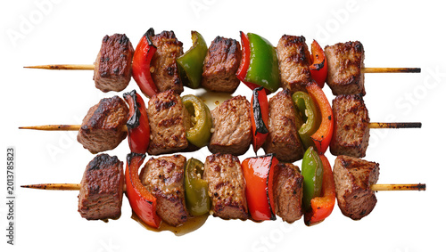 Tableau sur toile Isolated delicious and savory grilled beef skewers with vibrant red and green be