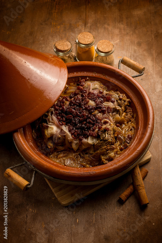 traditional moroccan lamb tajine with onions and dried grapes