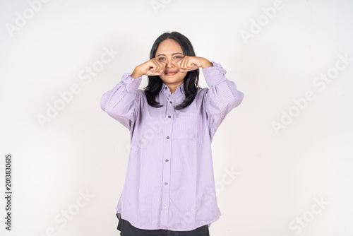 Konstfotografi Woman pinches her nose, showing disgust