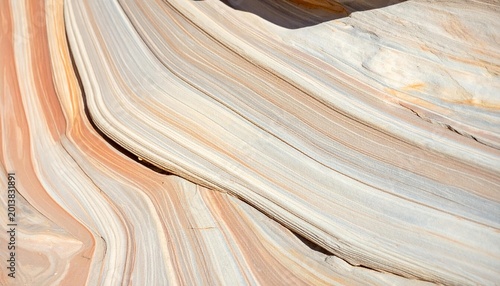 A close up view of colorful wavy rock formations.