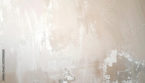 Textured wall with neutral paint strokes and peeling surface.
