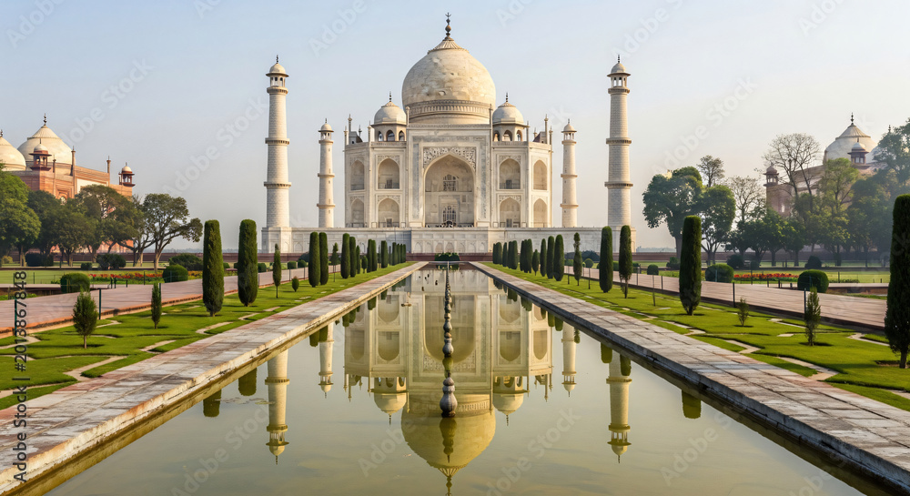 Fototapeta premium Iconic Taj Mahal Mausoleum with Water Reflection in Agra India