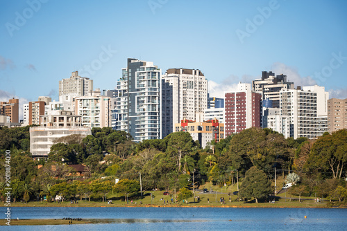 Curitiba, capital and largest city in the state of Parana in Southern Brazil. Showcasing the modern cityscape blending with the natural beauty of a public municipal Barigui Park.