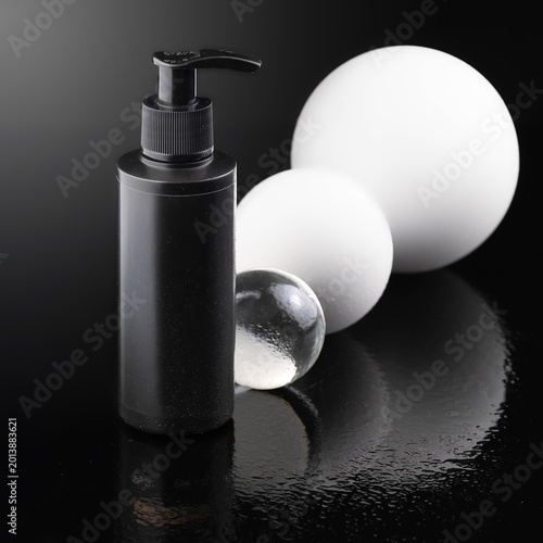 Luxury Black Cosmetic Product Mockups on Geometric Pedestals with Abstract Background