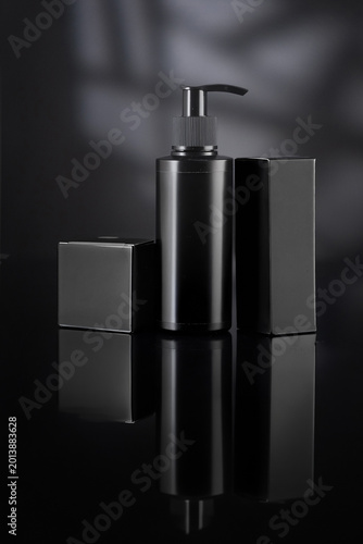 Luxury Black Cosmetic Product Mockups on Geometric Pedestals with Abstract Background