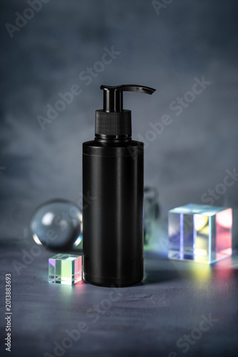 Luxury Black Cosmetic Product Mockups on Geometric Pedestals with Abstract Background