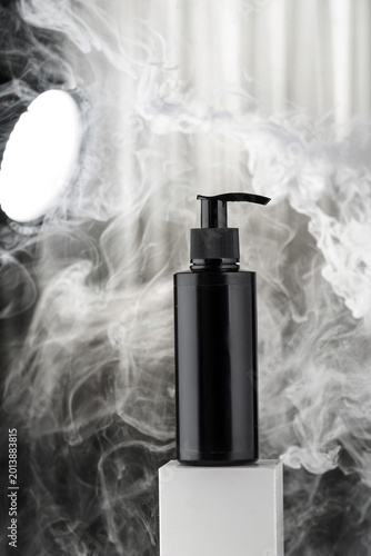 Luxury Black Cosmetic Product Mockups on Geometric Pedestals with Abstract Background