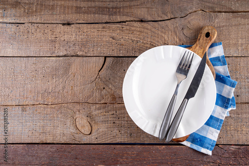 Tableau sur toile Cooking, culinary background with wooden cutting board