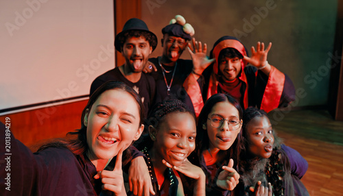 Photography Indian young adult gen z male man female look camera take selfie photos have fun joy hall stage place