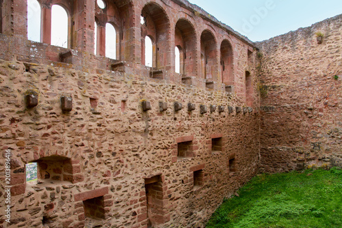 Bild auf Leinwand Interior ruins of Saint Ulrich castle with stone walls and romanesque arched windows