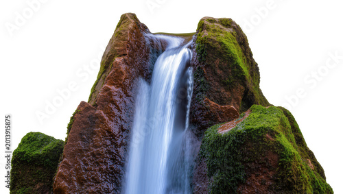 Photos Isolated captivating waterfall with silky water flowing over lush green mossy ro