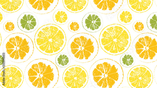 Seamless pattern of citrus fruit cross-sections with lemon and lime slices. 