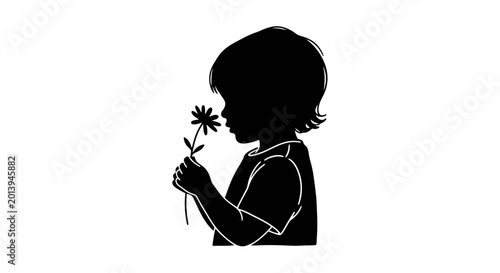 Black silhouette of a young child holding a flower.