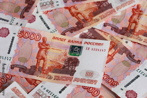 Tableau sur toile Pile of scattered five thousand Russian ruble banknotes close up