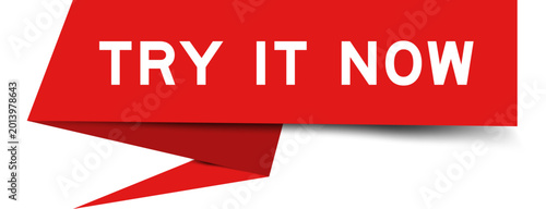 Red color speech banner with word try it now on white background