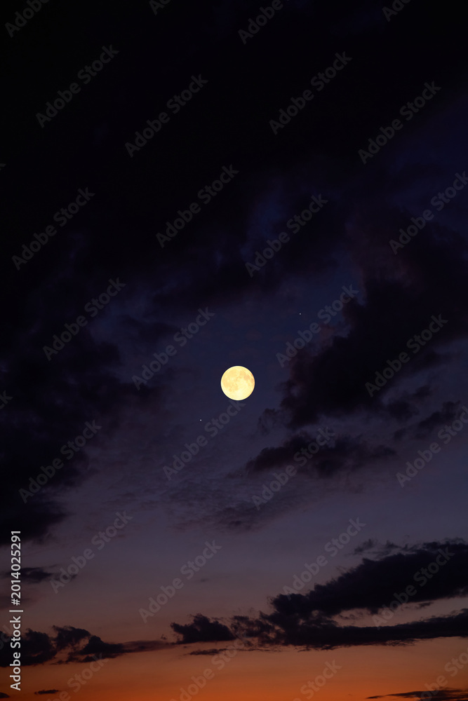 Fototapeta premium Full Moon on a twilight background.