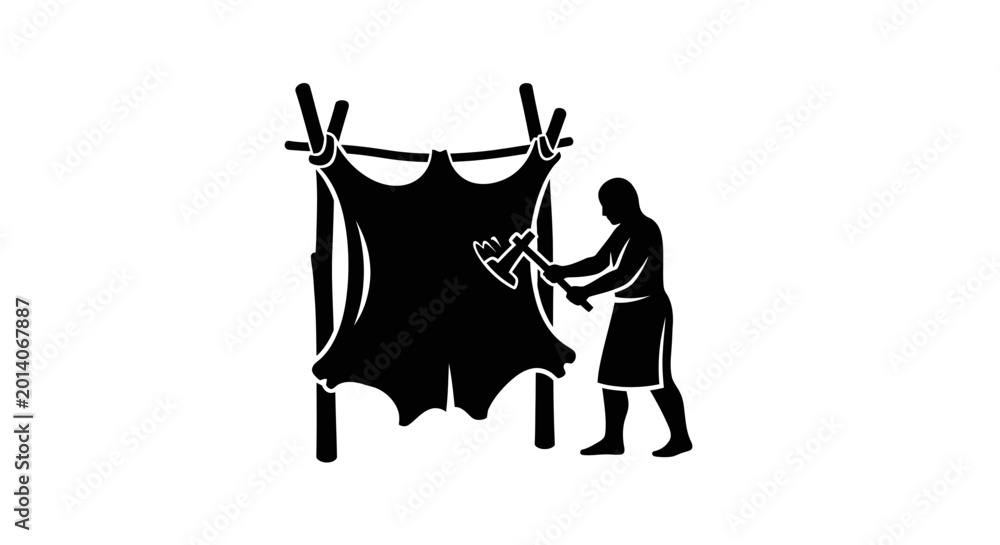 Fototapeta premium Man Hanging Up a Large Hide.