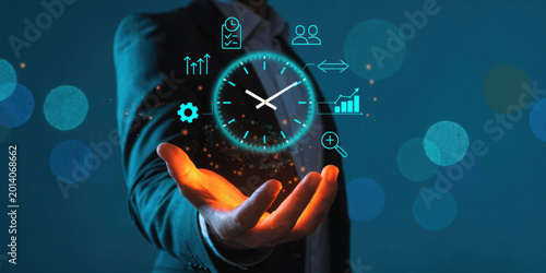 Time management concept with clock and business icons glowing above open hand, symbolizing productivity and efficiency in work